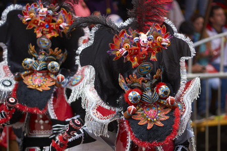 ORURO, BOLIVIA - FEBRUARY 25, 2017: Morenada dancers in ornate costumes parade through the mining city of Oruro on the Altiplano of Bolivia during the annual carnival.のeditorial素材