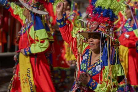 ORURO, BOLIVIA - FEBRUARY 25, 2017: Tinkus dancers in colourful costumes performing at the annual Oruro Carnival. The event is designated by UNESCO as being Intangible Cultural Heritage of Humanity.のeditorial素材