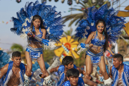 ARICA, CHILE - JANUARY 24, 2016: Tobas dancers in traditional Andean costume performing at the annual Carnaval Andino con la Fuerza del Sol in Arica, Chile.のeditorial素材
