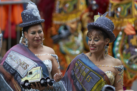 ORURO, BOLIVIA - FEBRUARY 25, 2017: Morenada dancers in ornate costumes parading through the mining city of Oruro on the Altiplano of Bolivia during the annual carnival.のeditorial素材