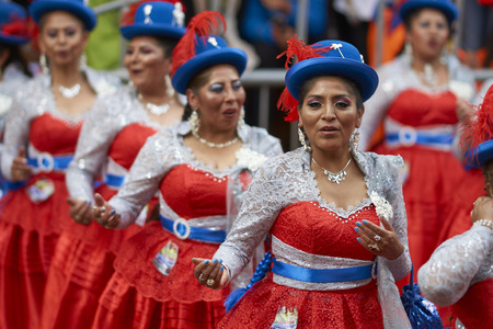 ORURO, BOLIVIA - FEBRUARY 25, 2017: Morenada dancers in ornate costumes parading through the mining city of Oruro on the Altiplano of Bolivia during the annual carnival.のeditorial素材