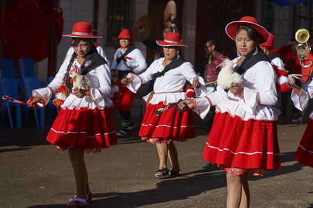 ORURO, BOLIVIA - FEBRUARY 26, 2017: Llamerada dancers in ornate costumes performing as they parade through the mining city of Oruro on the Altiplano of Bolivia during the annual carnival.のeditorial素材