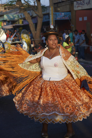 Arica, Chile - January 24, 2016: Morenada dancers in traditional Andean costume performing at the annual Carnaval Andino con la Fuerza del Sol in Arica, Chile.のeditorial素材