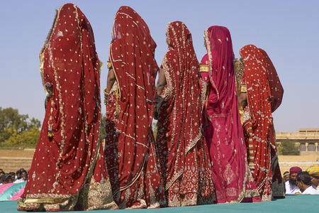 Jaisalmer, Rajasthan, India - February 19, 2008: Group of women in colourful sari's at the annual Desert Festival in Jaisalmer, Indiaのeditorial素材