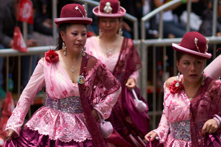 ORURO, BOLIVIA - FEBRUARY 26, 2017: Morenada dance group in colourful outfits parading through the...