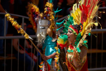ORURO, BOLIVIA - FEBRUARY 26, 2017: Tobas dancers in colourful costumes performing at the annual...