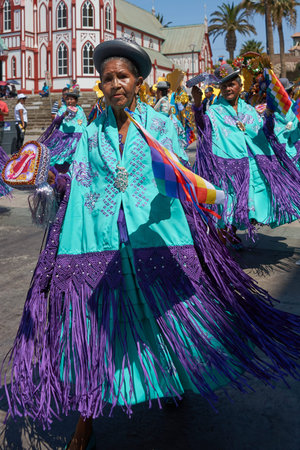 ARICA, CHILE - FEBRUARY 11, 2017: Morenada Dance Group performing during a street parade at the...