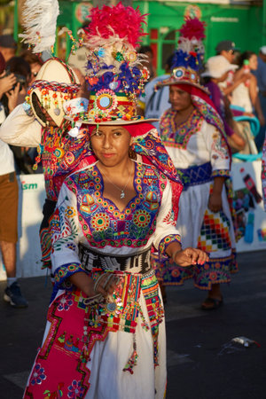 ARICA, CHILE - FEBRUARY 11, 2017: Tinkus Dance Group dressed in ornate costumes performing a...
