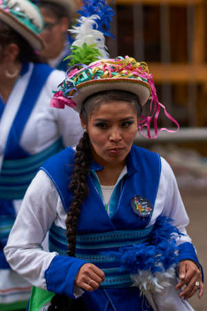 ORURO, BOLIVIA - FEBRUARY 26, 2017: Traditional folk dancers in ornate costumes performing as they parade through the mining city of Oruro on the Altiplano of Bolivia during the annual carnival.のeditorial素材