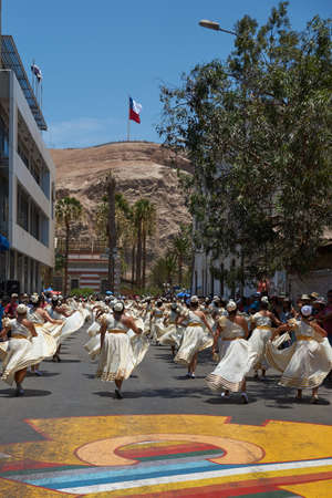 ARICA, CHILE - FEBRUARY 11, 2017: Group of dancers of Africa descent (Afrodescendiente) performing at the annual Carnaval Andino con la Fuerza del Sol in Arica, Chile.のeditorial素材