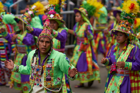 ORURO, BOLIVIA - FEBRUARY 26, 2017: Tinkus dance group in ornate costumes performing as they parade...