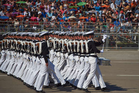 SANTIAGO, CHILE - SEPTEMBER 19, 2016: Members of the Armada de Chile march past during the annual military parade as part of the Fiestas Patrias commemorations in Santiago, Chile.のeditorial素材