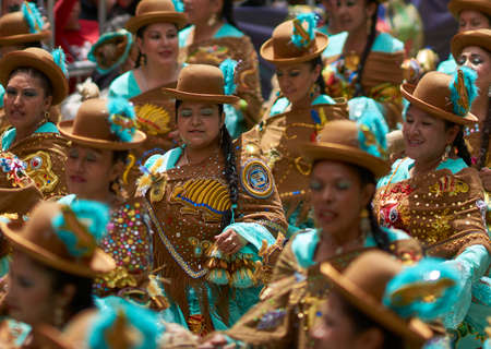ORURO, BOLIVIA - FEBRUARY 25, 2017: Morenada dancers in ornate costumes parade through the mining city of Oruro on the Altiplano of Bolivia during the annual carnival.のeditorial素材