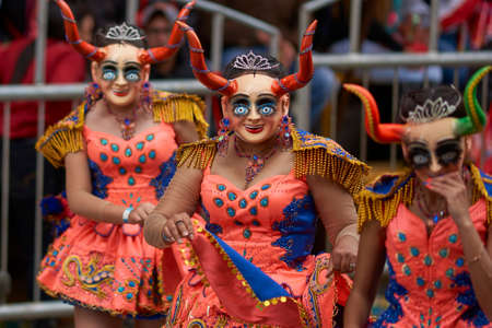 ORURO, BOLIVIA - FEBRUARY 25, 2017: Diablada dancers in ornate costumes parade through the mining city of Oruro on the Altiplano of Bolivia during the annual carnival.のeditorial素材