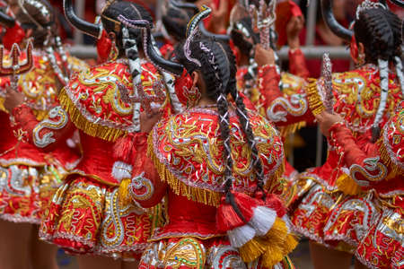 ORURO, BOLIVIA - FEBRUARY 25, 2017: Diablada dancers in ornate costumes parade through the mining city of Oruro on the Altiplano of Bolivia during the annual carnival.のeditorial素材