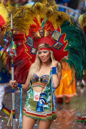 ORURO, BOLIVIA - FEBRUARY 25, 2017: Tobas dancers in colourful costumes performing at the annual...