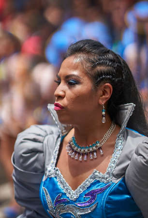 ORURO, BOLIVIA - FEBRUARY 25, 2017: Caporales dancers in ornate costumes performing as they parade through the mining city of Oruro on the Altiplano of Bolivia during the annual carnival.のeditorial素材