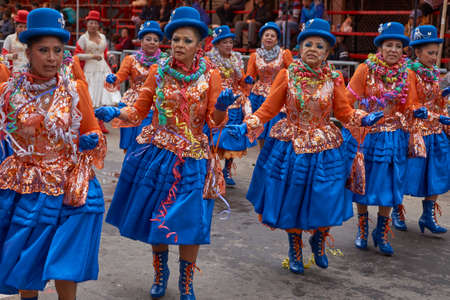 ORURO, BOLIVIA - FEBRUARY 26, 2017: Morenada dancers in ornate costumes parade through the mining city of Oruro on the Altiplano of Bolivia during the annual carnival.のeditorial素材