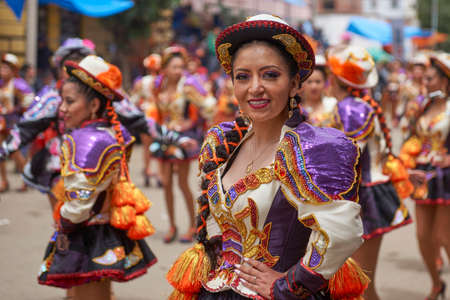 ORURO, BOLIVIA - FEBRUARY 26, 2017: Caporales dancers in ornate costumes performing as they parade through the mining city of Oruro on the Altiplano of Bolivia during the annual carnival.のeditorial素材
