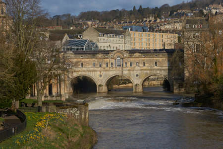 Bath, England - March 13, 2021: Pulteney Bridge over the River Avon in in the historic city of Bath, in Somerset, England.のeditorial素材