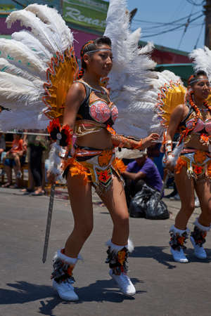 ARICA, CHILE - JANUARY 23, 2016: Tobas dancers in traditional Andean costume performing at the annual Carnaval Andino con la Fuerza del Sol in Arica, Chile.のeditorial素材