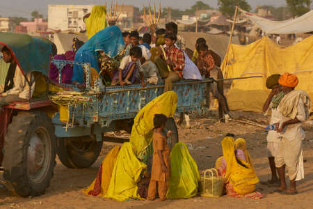 Pushkar, Rajasthan, India - November 9, 2008: Tractor and trailer provide transport at the annual Pushkar Camel Fair in. Rajasthan, India.のeditorial素材