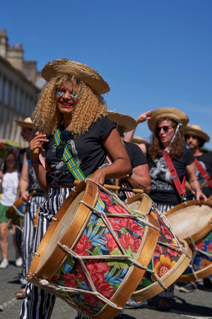 Bath, England, United Kingdom - 9 July 2022: Drumming band performing at the annual carnival as it progresses through the streets of the historic city of Bath in Somerset.のeditorial素材