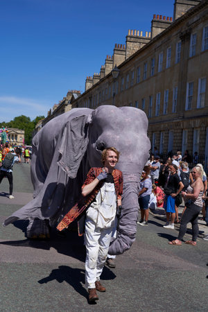 Bath, England, United Kingdom - 9 July 2022: Carnival parade progressing through the streets of the historic city of Bath in Somerset.のeditorial素材
