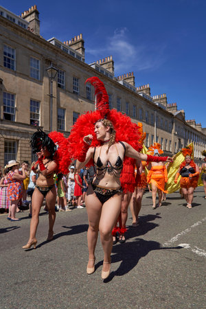 Bath, England, United Kingdom - 9 July 2022: Dancers in ornate costumes performing at the annual carnival as it progresses through the streets of the historic city of Bath in Somerのeditorial素材