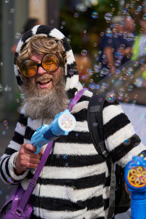 Bath, England, United Kingdom - 9 July 2022: Carnival parade progressing through the streets of the historic city of Bath in Somerset.のeditorial素材