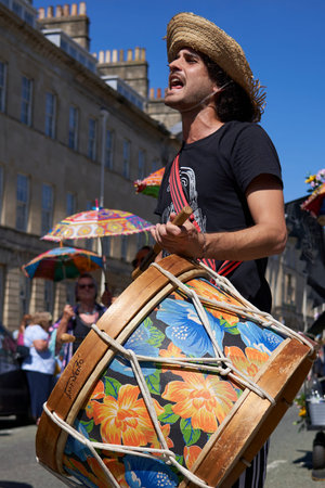 Bath, England, United Kingdom - 9 July 2022: Drumming band performing at the annual carnival as it...