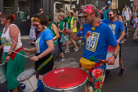 Bath, England, United Kingdom - 9 July 2022: Drumming band performing at the annual carnival as it...