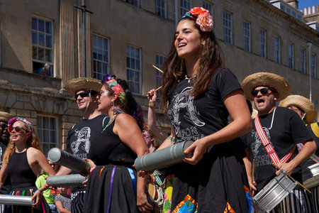Bath, England, United Kingdom - 9 July 2022: Drumming band performing at the annual carnival as it...