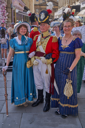 Bath, England, United Kingdom - 9 September 2023: Parade of people dressed in period costume from the Georgian era as part of the annual Jane Austen festival in Bath, Somerset, UKのeditorial素材