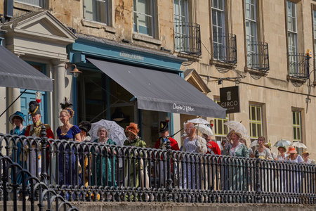 Bath, England, United Kingdom - 9 September 2023: Parade of people dressed in period costume from the Georgian era as part of the annual Jane Austen festival in Bath, Somerset, UKのeditorial素材