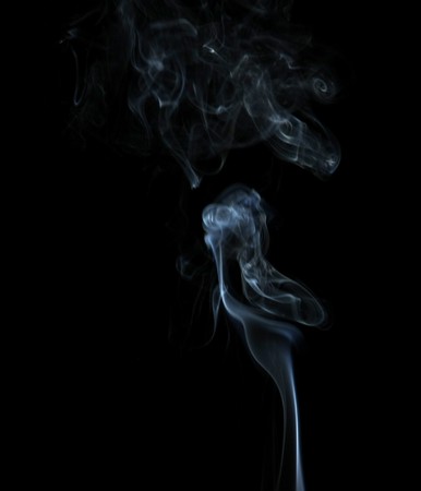 Smoke with a black background. Abstract element to help your designの写真素材