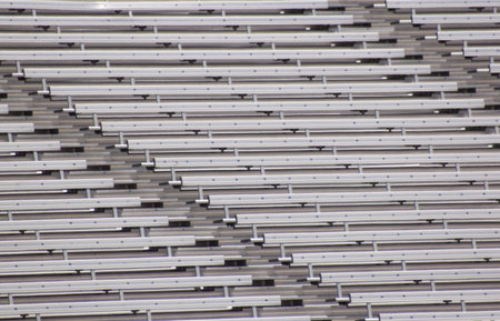 Empty bleachers on a warm summer day.の写真素材