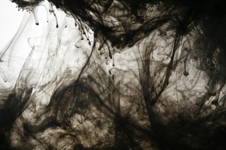 Smoke liquid ink in waterの写真素材