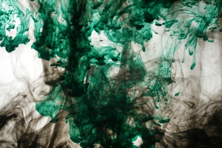 Smoke liquid ink in waterの写真素材