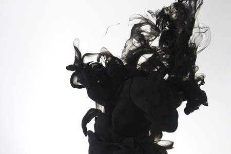 Smoke liquid ink in waterの写真素材