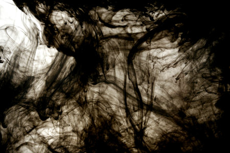 Smoke liquid ink in waterの写真素材