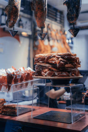 Ham shop window with stacked ham sandwichesの写真素材