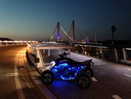 Lighted bridge with ATV in Kanneの素材