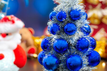 Close-up of blue christmas tree, and Christmas Holiday Season background with decorations. Merry Christmas New Year collection, gifts and decorative ornaments. Empty copy space for text.の写真素材