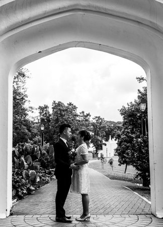 Asian loving couple pre-wedding outdoor photo shoot. Casual natural real people portraits. Loving romantic couple.の写真素材