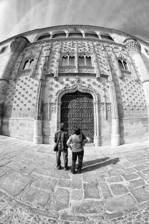 People admire the facade of Jabalquinto Palace in Baeza, Spainのeditorial素材