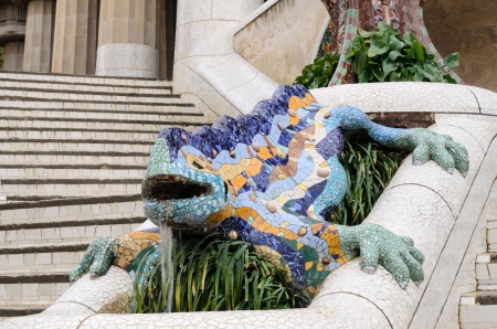 Ceramic dragon fountain in Parc Guell - park city designed by Antoni Gaudi  Spainの写真素材