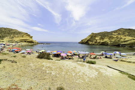 Pulpi, Spain - June 05 People enjoying on the beautiful cove of Los Cocedores. Pulpi, AlmerÃ­a June 05, 2016のeditorial素材