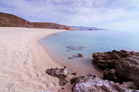 Los Muertos beach (Playa de los muertos) in Cabo de Gata Nijar Natural Park, Almeria, Andalusia, Spain. Very popular spot with tourists. Most famous beach in the area. Close to Carboneras village.の写真素材