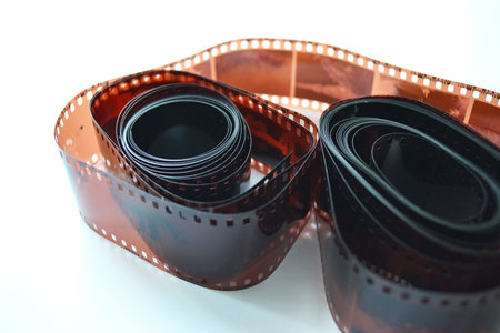 35mm color negative film on white background.